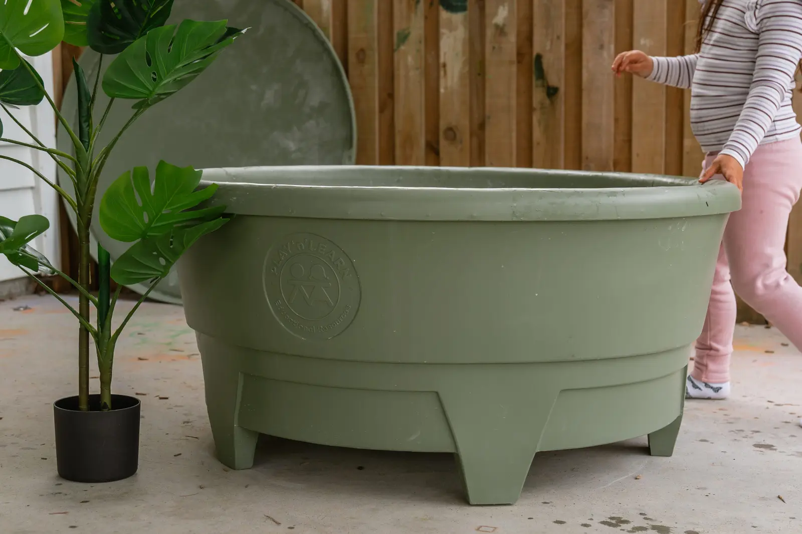Outdoor centre scene with PlayTray used for sensory play